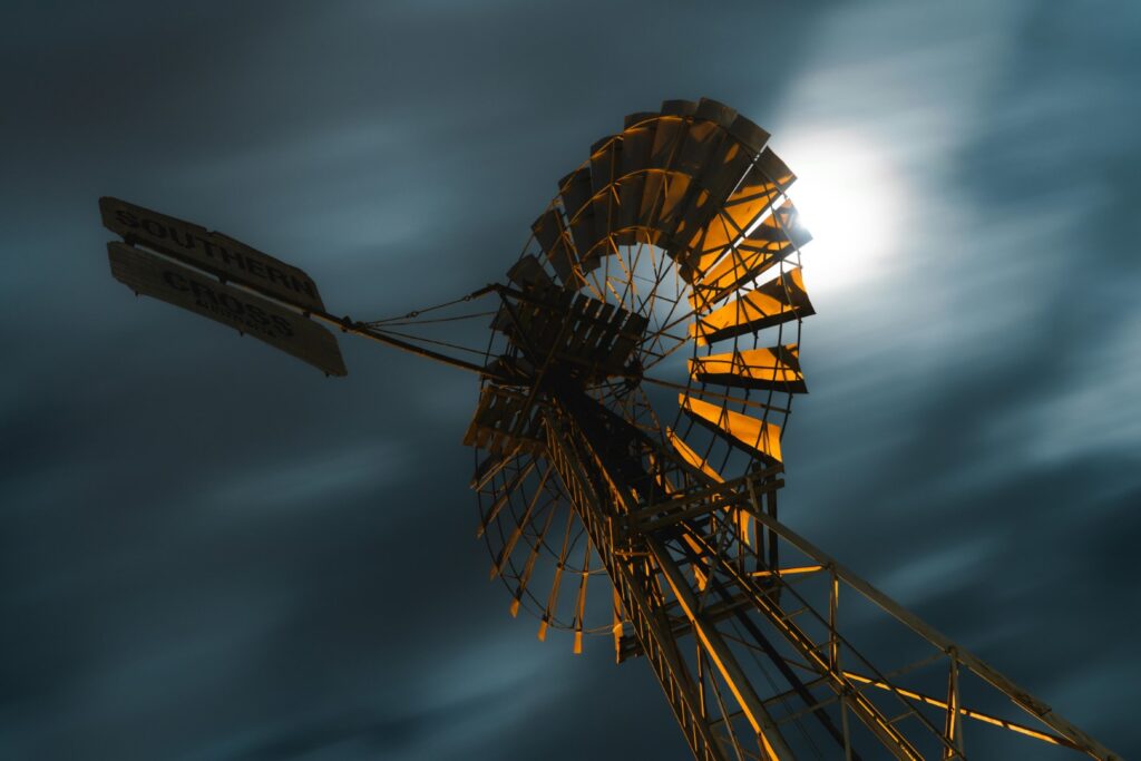 A Southern Cross windmill with a stormy background.