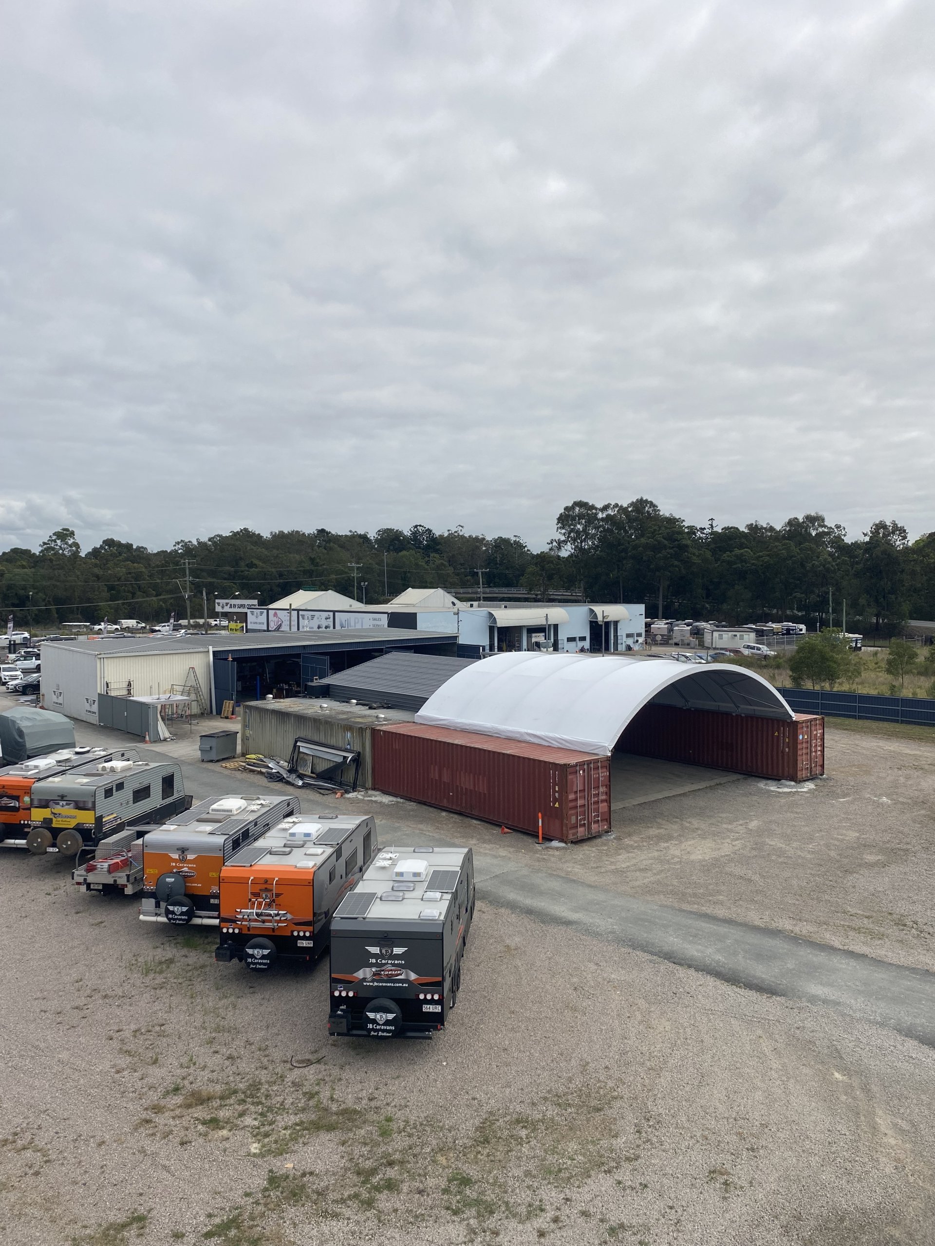 a group of trucks parked in a parking lot